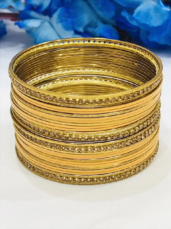 Engraved Gold Bangles-Alluring Yellow Color Stone Design Metal Bangles For Women