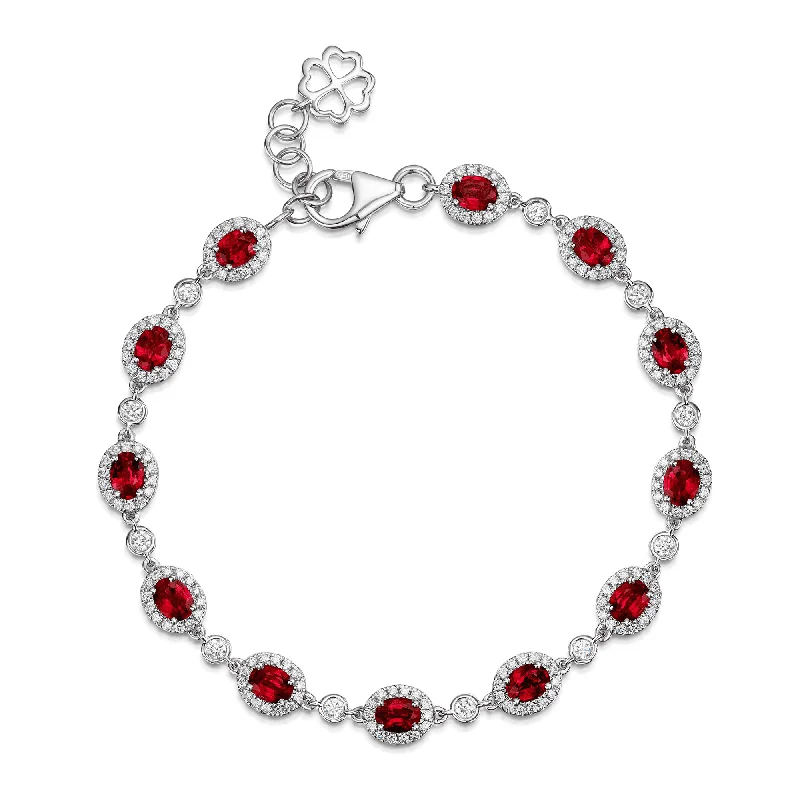 Minimalist Silver Bracelets-18ct White Gold Oval Ruby And Diamond Halo Bracelet