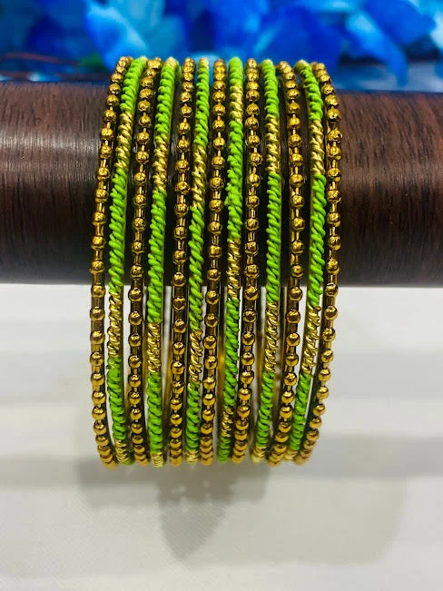 Beautiful Gemstone Bangles-Alluring Green Color Trendy Antique Gold Bangles For Wedding